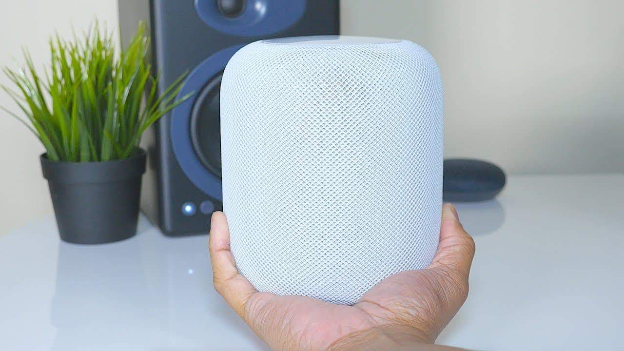 Apple HomePod In A Hand