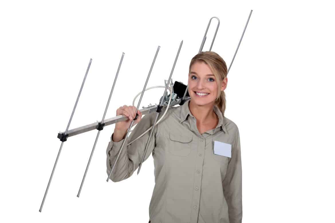 Woman carrying Long Range TV antenna