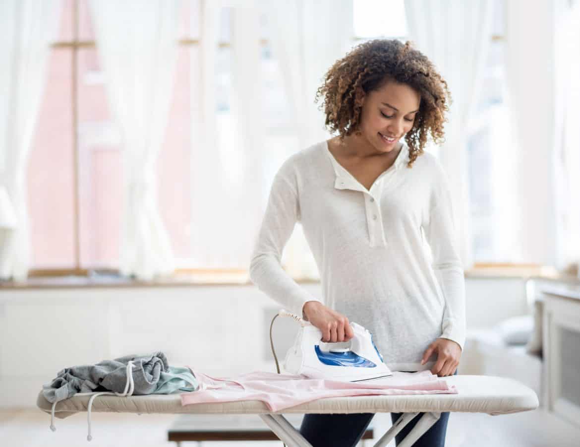 Woman With garment Steamer