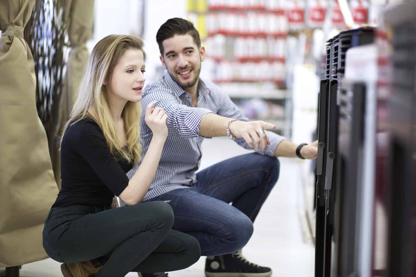 Couple Looking At Dual hose AC