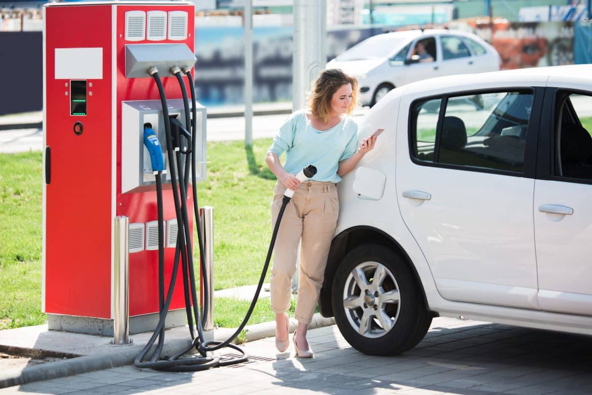 Woman With An Electric Car