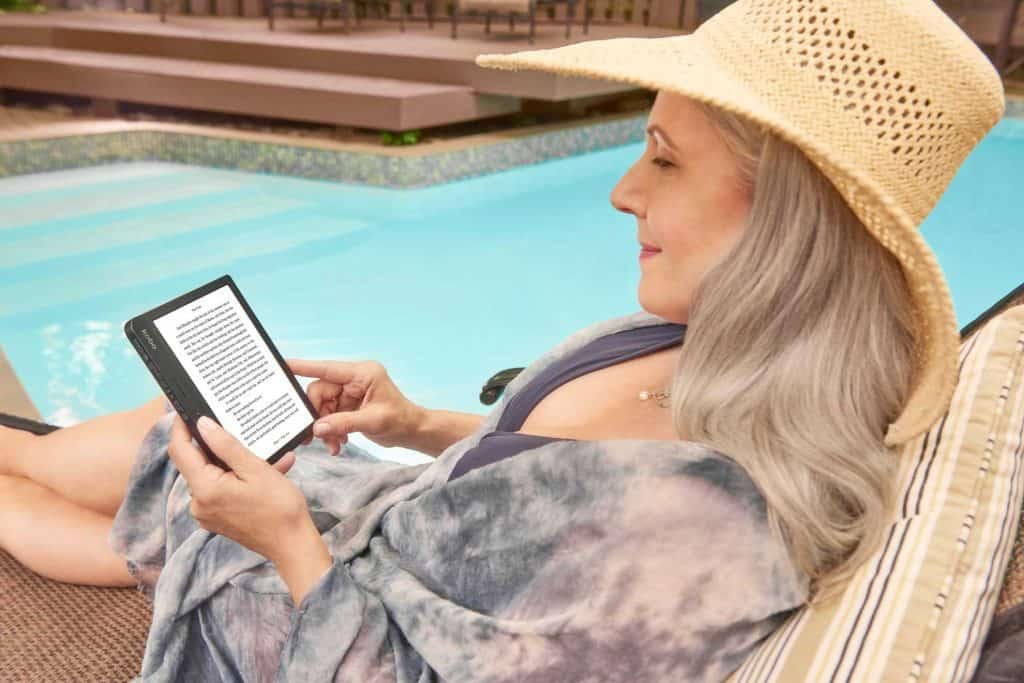 woman holding a kobo device