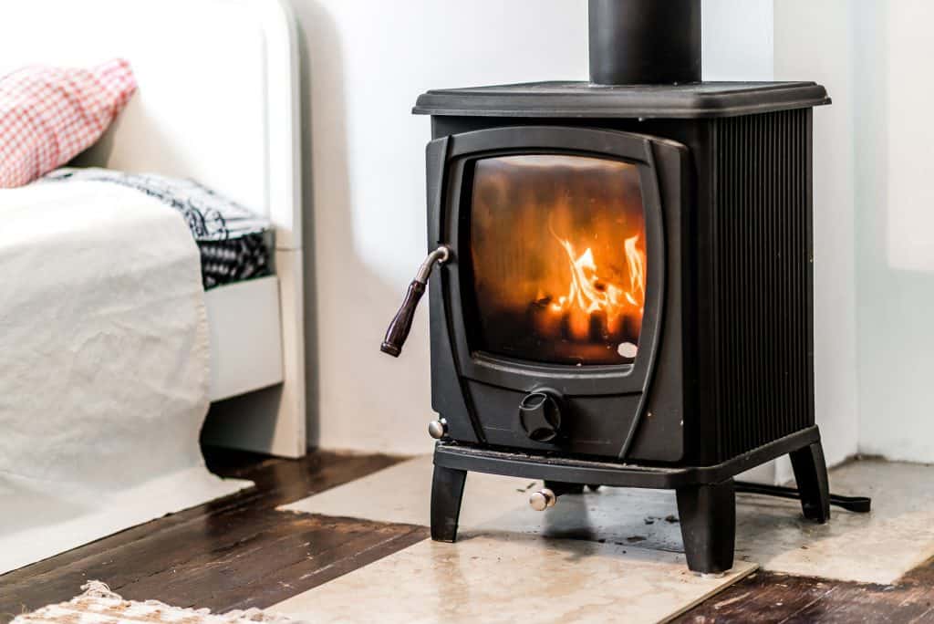 Wood burning stove in bedroom