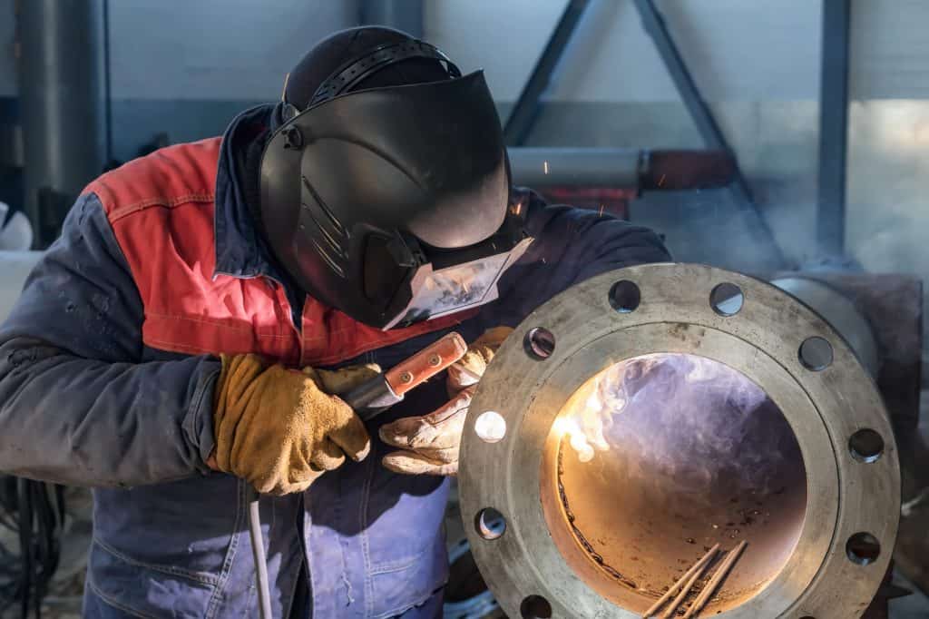 welding with protective gloves