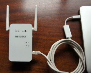 How do I use my NETGEAR Wi-Fi Extender as a router?