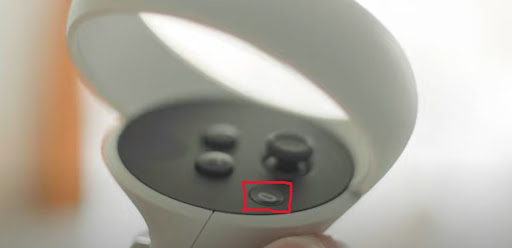 Press the Oculus “O” button on the controller.