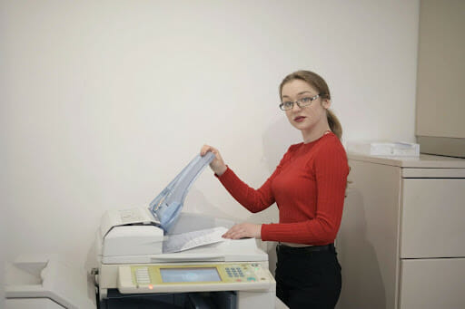 Woman Using a Printer